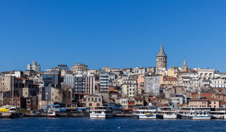 Galata Tower located between buildings