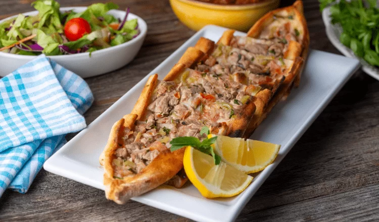 pita with cut lemon on a plate