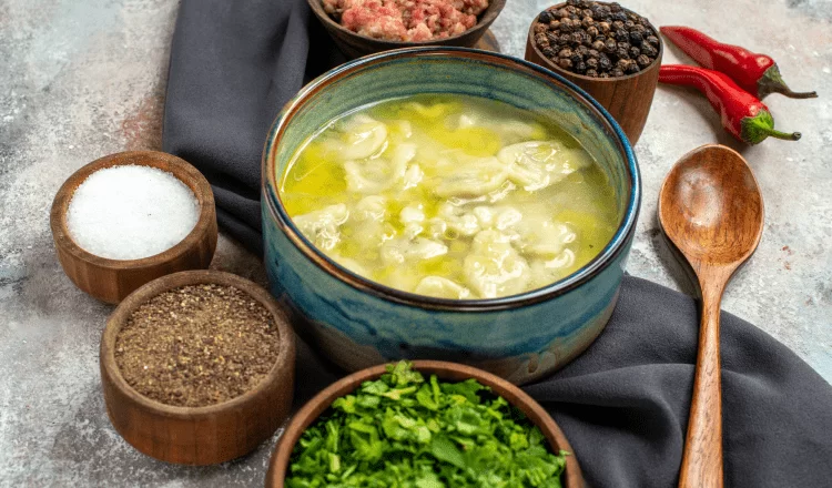 An image with tripe soup in a bowl