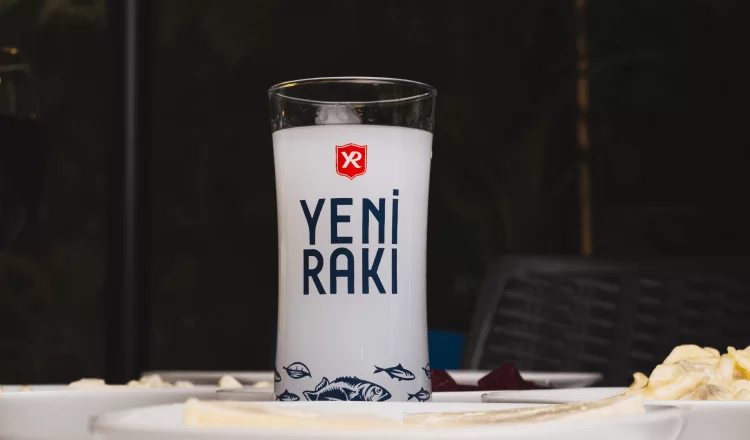 A glass of raki standing on the table